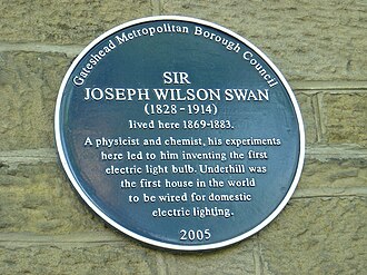 Historical plaque at Underhill, the first house to be lit by electric lights