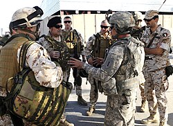 Italian Major General Giovanni Armentani, Deputy Commanding General for the NATO Training Mission, meets with a US Advise and Assist Brigade.