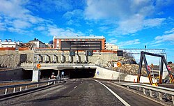 Tunnels, such as the Tampere Tunnel, allow traffic to pass underground or through rock formations.