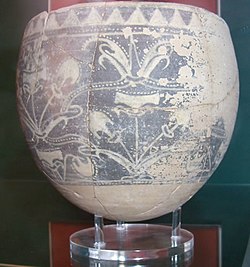 Atchana-Nuzi ware bowl found in Alalakh. From Levels III-II, Late Bronze Age, circa 1370-1270 BC. According to the excavator L. Woolley, this represents a locally produced variant of Nuzi ware, first recognized at the site of Nuzi in Iraq. Characteristic of the Atchana ware are the floral designs, not found in the Nuzi ware.[17] British Museum.