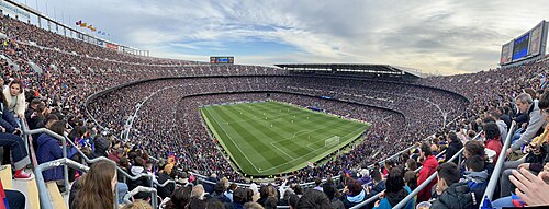 The official record attendance for a women's football match was set at Camp Nou on 22 April 2022, with 91,648 people watching Barcelona defeat Wolfsburg 5–1 (pictured).[99]
