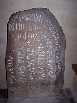 The Stentoften Stone, bearing a runic inscription that likely describes a blót of nine he-goats and nine male horses bringing fertility to the land[14]