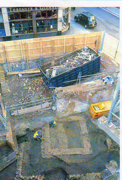 Excavation in phase has reduced this site to the occupation level of a Romano-Celtic temple (56 Gresham Street, London)