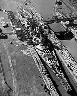 USS Missouri, an Iowa-class battleship, passes through the canal on 13 October 1945. The 108 ft 2 in (32.97 m) beams of the Iowas and preceding South Dakota class were the largest ever to transit the Canal.