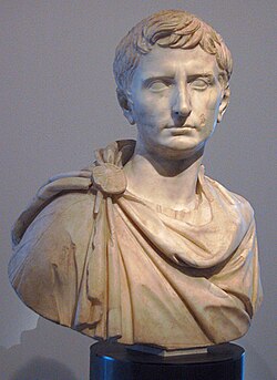 A marble carved bust depicting Octavian wearing a toga