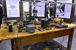 Exhibition to mark the 75th anniversary of the discovery of nuclear fission, at the Vienna International Centre in 2013. The table (on loan from the Deutsches Museum Munich) is now described as a replica and images of Meitner and Strassmann are prominently displayed.