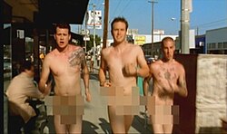 The music video for "What's My Age Again?" depicts the band running naked through the streets of Los Angeles in 1999.[32][50]