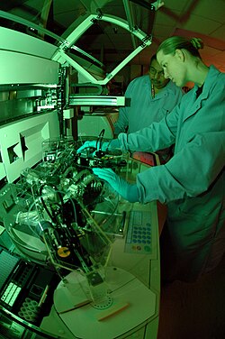 An allergy testing machine being operated in a diagnostic immunology lab