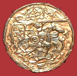 The gold bracteate of Pliezhausen (sixth or seventh century) shows typical iconography of the pagan period. The bracteate depicts the "horse-stabber underhoof" scene, a supine warrior stabbing a horse while it runs over him. The scene is adapted from Roman era gravestones of the region.[30]